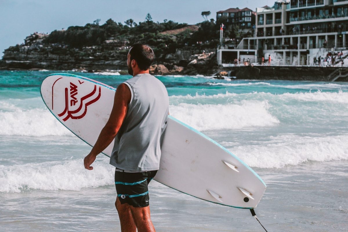 bondi beach man surfboard